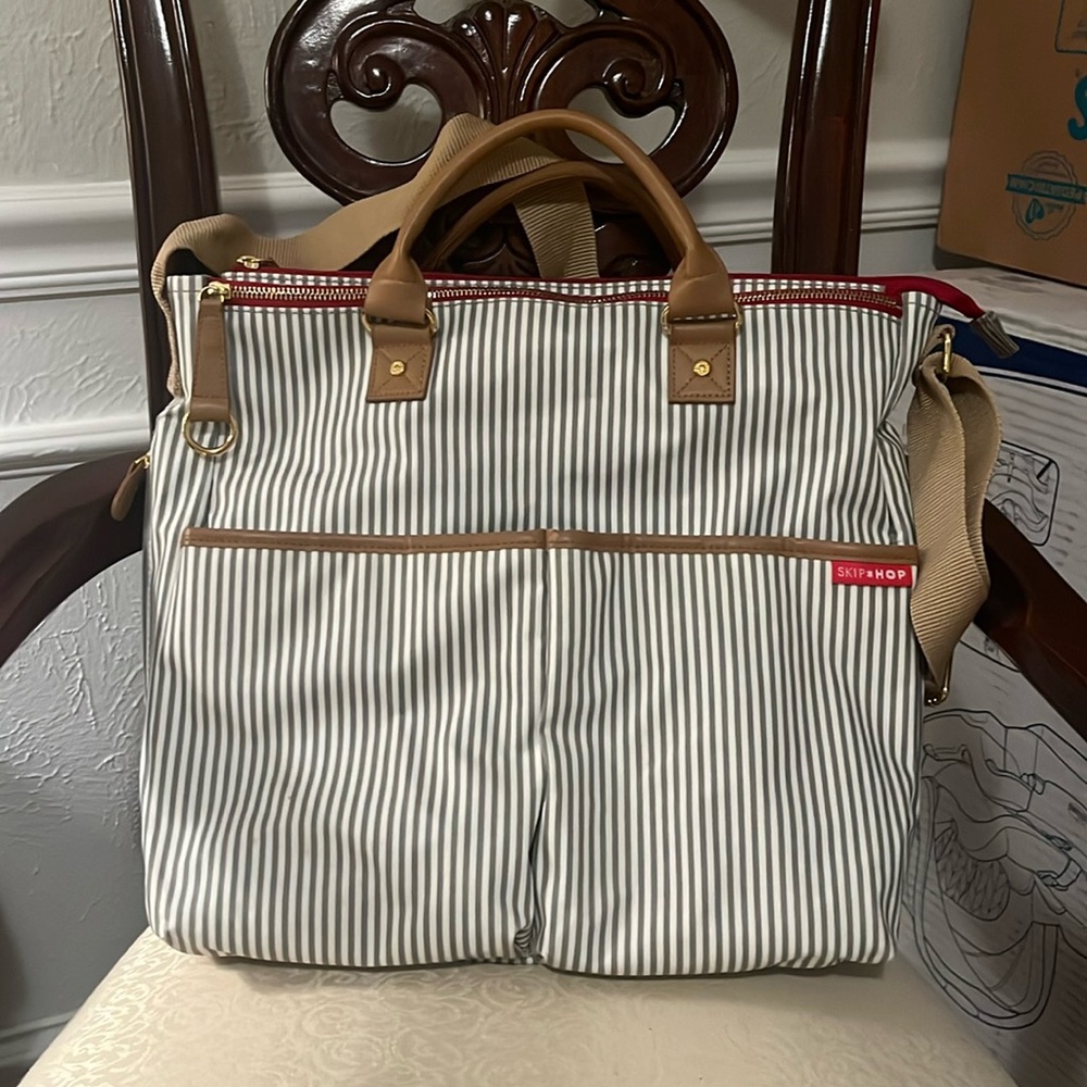 Summer cleaning gently used Skip Hop diaper bag